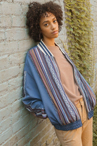 A Woven Jacket That Features Tribal Striped Accents